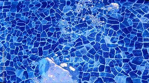 Bubbles rising to the surface. Air bubbles in water in swimming pool (underwater shot), good for backgrounds. Slow motion. Stock Video