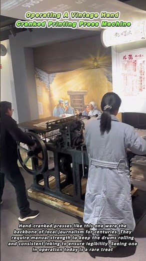 Operating A Vintage Hand Cranked Printing Press Machine