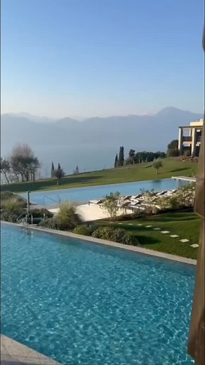 Lake Garda is Italy’s largest lake, where the shimmering water meets alpine silhouettes and Mediterranean ease. Luxury here is defined by hillside villas, infinity pools overlooking the water, and days that flow between culture, cuisine and calm. At Cape of Senses, perched some 800 feet above the lake near Torri del Benaco, every suite delivers panoramic views of mountain and water, and every detail is tuned to well being. The 55 suite, adults only resort features a 21,000 square foot Senses Spa