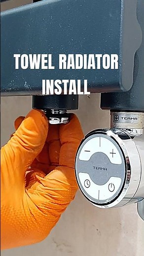 Installing a towel radiator with a digital thermostat element