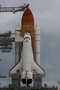 Atlantis Unveiled for Historic Final Flight amidst Stormy Weather