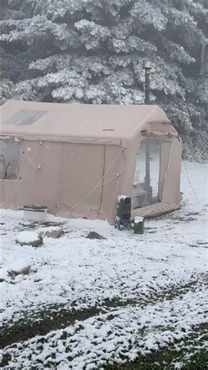 CAMPING IN THE STORM - CUTTING WOOD TO KEEP WARM.