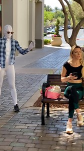 Girl pranks her friend at the park. | Tommy Wind