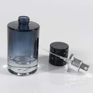 [Hot Item] Custom 30ml 50ml 100ml Refillable Round Blue Empty Men Cologne Fine Mist Spray Glass Perfume Bottle with Round Black Spray Cap