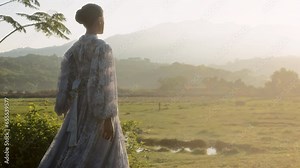 Woman In Sheer Dress Embracing Sunrise