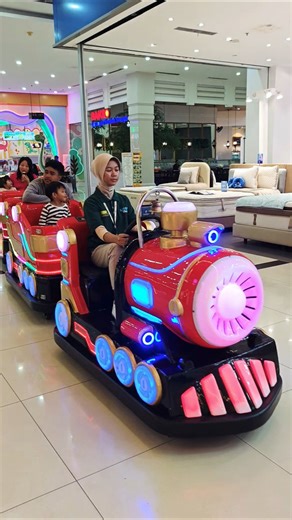 naik kereta apii tut