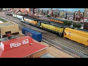CNW N-scale unit coal and grain trains.