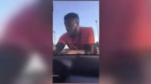 Teacher jumps on carpool 'cutters' car