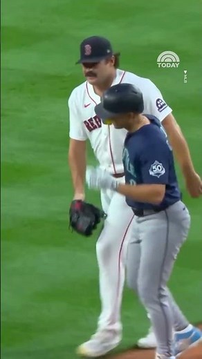 Payton Tolle tags Dominic Canzone with a hug