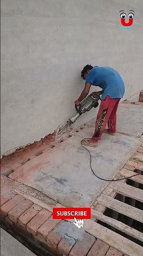 Chipping the wall with a Hilti machine | Constraction work