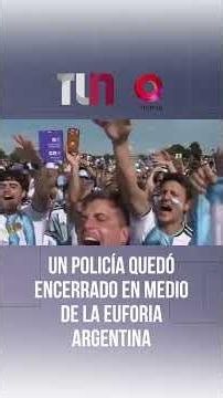 A POLICE OFFICER GOT TRAPPED IN THE MIDDLE OF THE ARGENTINE EUPHORIA