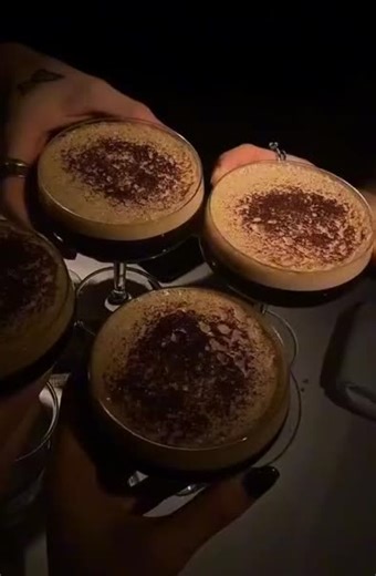 A toast to the girls who never raise their voice—only their standards. 🍸 French tips. Bitter drinks. Heavy rings. She doesn’t talk much. But she always finishes the night remembered. #darkfemme #richvibes #cocktailaesthetic #luxurynight #darkfeminineaesthetic Close-up of a woman’s manicured hands holding a cocktail in a dim bar setting, wearing fur and minimal gold jewelry. The mood is luxury, mystery, and elegance.