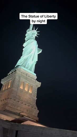 Nighttime Views of the Statue of Liberty with Manhattan Skyline and Fireworks