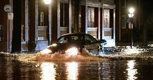 Northeast hit by heavy rain, flood warnings and power outages, with more bad weather in store