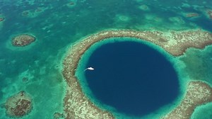 clip-1051315111-aerial-view-yacht-moving-on-marine-sinkhole