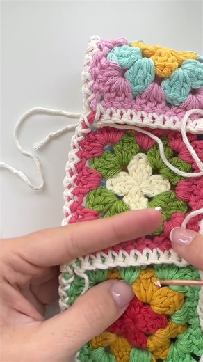 Do multicolor granny squares bucket hat make anyone else's heart sing?💖 Share your latest projects with them! And if you're on the hunt for new ideas, my tutorial on YouTube is packed with inspiration. . . . . . #CraftLibrary #CrochetSweater, #CrochetJumper, #CrochetShrug, #CrochetSweatshirt, #CrochetPullover, #CrochetTutorial, #CrochetHowTo, #CrochetInstructions, #LearnToCrochet, #CrochetTips, #CrochetLesson, #CrochetGuide, #CrochetForBeginners, #CrochetVideo, #CrochetEducation, #CrochetTeache