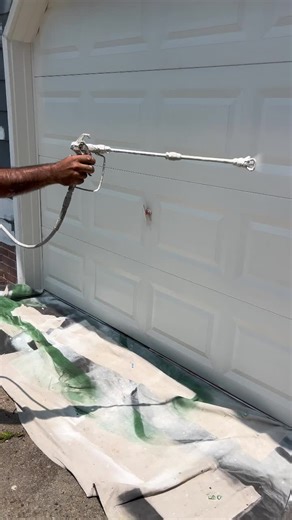 Spraying the exterior garage door! 🚪🎨 Smooth, even coverage for that clean Showstopper finish. 💪✨ ShowstopperPainting.com • 757-450-6239 • 804-916-1024 #ShowstopperPainting #ThePainterInc #ExteriorPainting #GarageDoor #PaintSpraying #ShowstopperQuality #VAPainters #CurbAppeal #FlawlessFinish