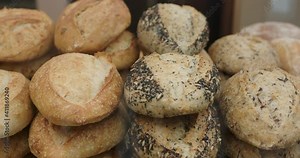Assortment of baked bread in a bakery window display close-up