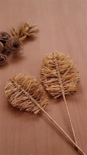 3.7K views · 367 reactions | DIY Raffia Leaf Decoration 癩 Turn simple raffia into beautiful rustic leaves!  Perfect for fall decor, bouquets, or handmade home decorations. Easy, natural, and budget-friendly craft #createdbyandi #DIY #autumn #handmade #reels | Created by Andi | Facebook