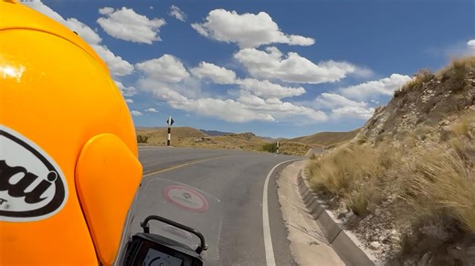 The Alaska riders ride in Peru from Arequipa to Puno. There are different route options. We decide to stay on the tarmac and visit a nice waterfall on the way called the Catarata de Pillone. It’s quite a climb down the rock face to get there, especially as we are at some 4600 meters altitude still. Some others of our group decide to visit the Salar de Moche and ride some 150km dirttrack. It made their day but also they arrive tired. Tomorrow there will be time for a tour by boat on Lake Titicaca