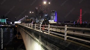 bus taxi phone box on Waterloo bridge at night London England . Tourism landmark vacation holiday London red London bus black taxi cab stock, footage, video, clip