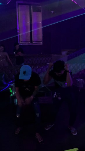 Dance Moves in a Neon-lit Setting