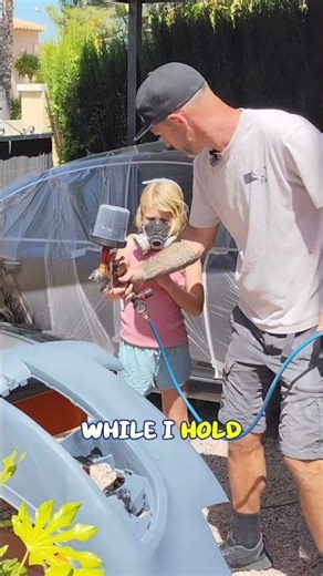 Dad Teaches Daughter How to Spray Paint