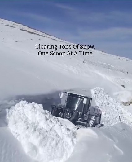 It’s an oddly satisfying scene of front-end loaders clearing feet of snow as winter comes to a close. | The Weather Channel