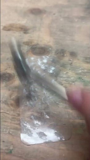 Smashing a phone screen protector with a mini hammer!