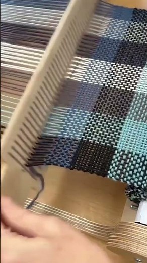 This is the process of threading in preparation for weaving