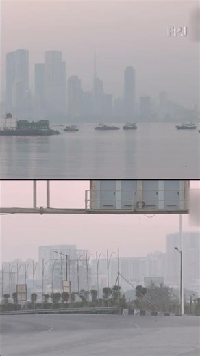 Bandra's skyline disappears in the haze. The AQI hits 145 (Moderate). Mumbai, take precautions!