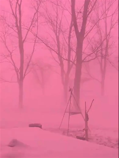 Bright Pink Sky Phenomenon in Iowa During Winter Storm