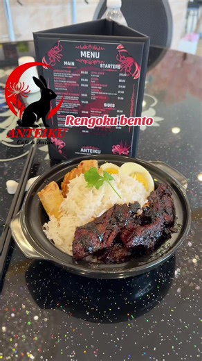 Rengoku Bento “A bento worthy of the Flame Hashira! Our Rengoku Bento comes stacked with tender beef in a savory glaze, jasmine rice, crispy veggie rolls, juicy gyoza, and a soft-boiled egg. Bold, fiery, and full of heart—just like Rengoku!” #RengokuBento #DemonSlayerFood #FlameHashira #AnimeCafe #AnimeEats #BeefBento #GyozaLovers #OtakuEats #FoodieTok #Rengoku #AnteikuCafe #BaldwinParkEats #BentoBoxLove