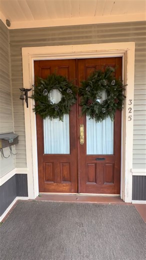 Touring Marc and Devin’s c. 1893 Queen Anne, perched on top of Cross Street on the hill up from Depot Town, felt like stepping into a dream. The home bursts with bold color, meaningful art, and beautifully preserved details like original trim and windows. Every corner of the home reflects careful restoration and modern creativity, woven together with so much intentional care. A beautiful example of how old homes shine brightest when their history is honored and at the same time, made uniquely th