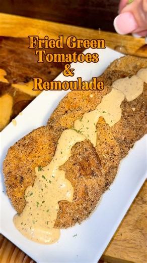 Fried Green Tomatoes 2 large green tomatoes 1 egg 1/2 cup flour, 1/2 cup cornmeal mixed OR 1 cup fish fry Cooking oil Tony's Creole seasoning (to taste) Paul's Veggie Seasoning (to taste) 1/2 teaspoon white pepper Salt to draw out water Place sliced tomatoes on rack and salt on both sides. Let sit for 30 mins to draw out excess water. Dry with paper towel and season with Tony's, pepper, and Paul's. Dip in egg, then batter. Place in HOT oil until golden and crispy. Serve with remoulade. | Bebop S