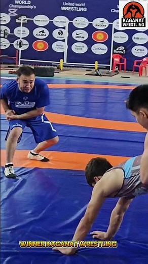 Coach Teaching Correct Greco-roman Wrestling Par Terre Throw