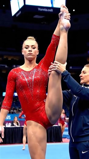 Coach Helps USA Gymnast Perfect Her High Leg Stretch Before the Routine
