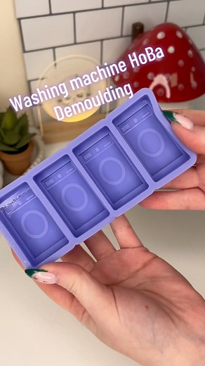 Demoulding our Washing Machine HoBa Silicone Mould. Perfect for the spring season!! Available now on our Website and Etsy! Don’t miss out! #cleaning #washingmachine #HoBa #SiliconeMould #ResinMould #CraftMould #MouldMaking #ResinArt #craftsupplies #SmallBusinessLove #silicone #HandmadeWithLove | Designed with a Twist