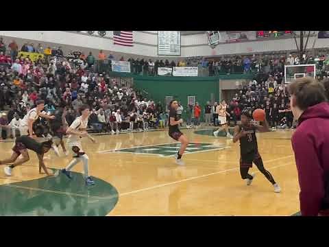 Highlights from D1 boys basketball district finals between Rockford and Muskegon