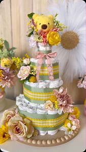 21K views · 238 reactions | A Winnie the Pooh inspired baby shower is the perfect theme, and a diaper cakes makes the perfect decoration-to-gift!  | Disney Baby | Facebook