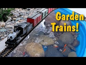 Big Model Trains Around The Pond And Through The Garden