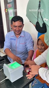 Jember Population and Civil Registration Office (Disdukcapil) officers continue to record e-KTPs,...