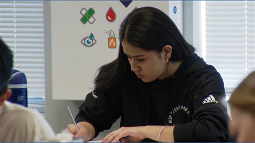 Aurora high school seniors earn college credits through dual-enrollment program