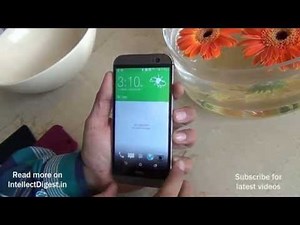 How To Insert SIM Card And Memory Card In 2014 HTC One M8- Video Tutorial