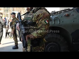 Italy’s inter-force police teams tighten security in Milan ahead of opening of Winter Olympics