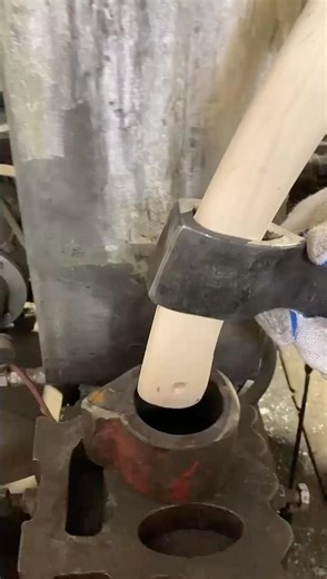 Handle on sludge axe in press