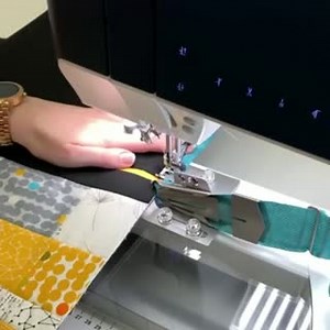 The PFAFF® Quilt Binder Attachment makes binding your quilt simple and precise. With a large opening to accommodate the quilt layers, this attachment gives you everything you need to finish the masterpiece you're working on. Learn more: https://www.pfaff.com/en-CA/Accessories/Quilt-Binder | Canadian Quilters Association