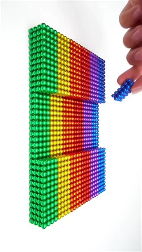 Building the World's Largest Magnetic Ball Bridge