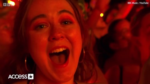 Michael J. Fox plays guitar with Coldplay at Glastonbury