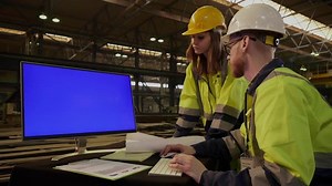 clip-1028168474-senior-engineer-showing-his-colleague-new-project